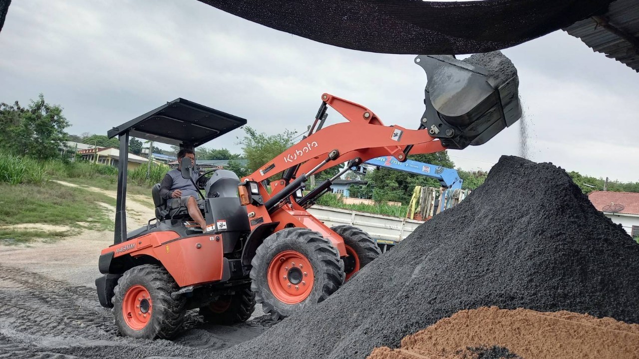 รูปการทำงานสินค้ารถตักล้อยาง